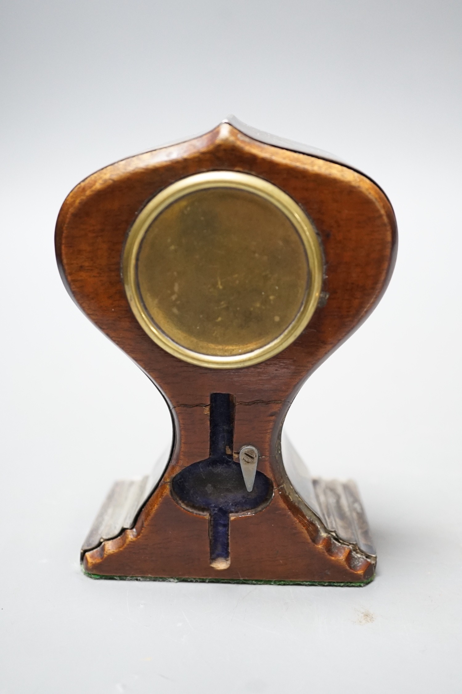 A George V silver mounted mantel timepiece, Henry Clifford Davis, Birmingham, 1914, height 12.8cm, lacking key.